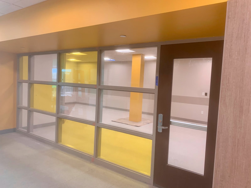 Nichols Community Health Center. Office with yellow film.