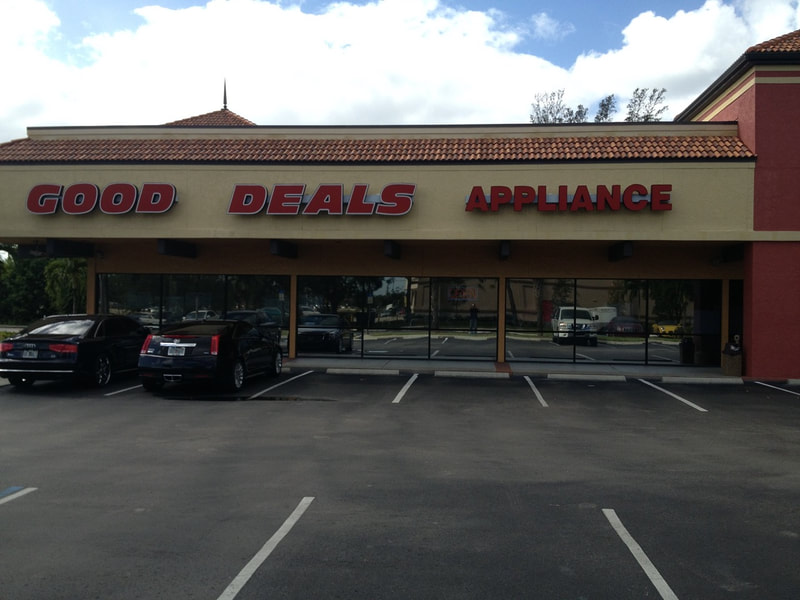 Tinted storefront glass at Good Deals Appliance in Fort Myers