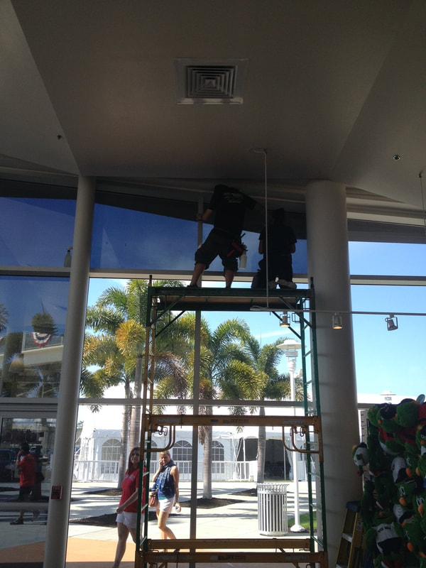 Beverly Hills installers inside JetBlue Park gift shop